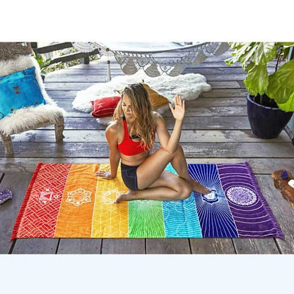 A blonde woman doing yoga on a 7 Chakra Yoga Mat